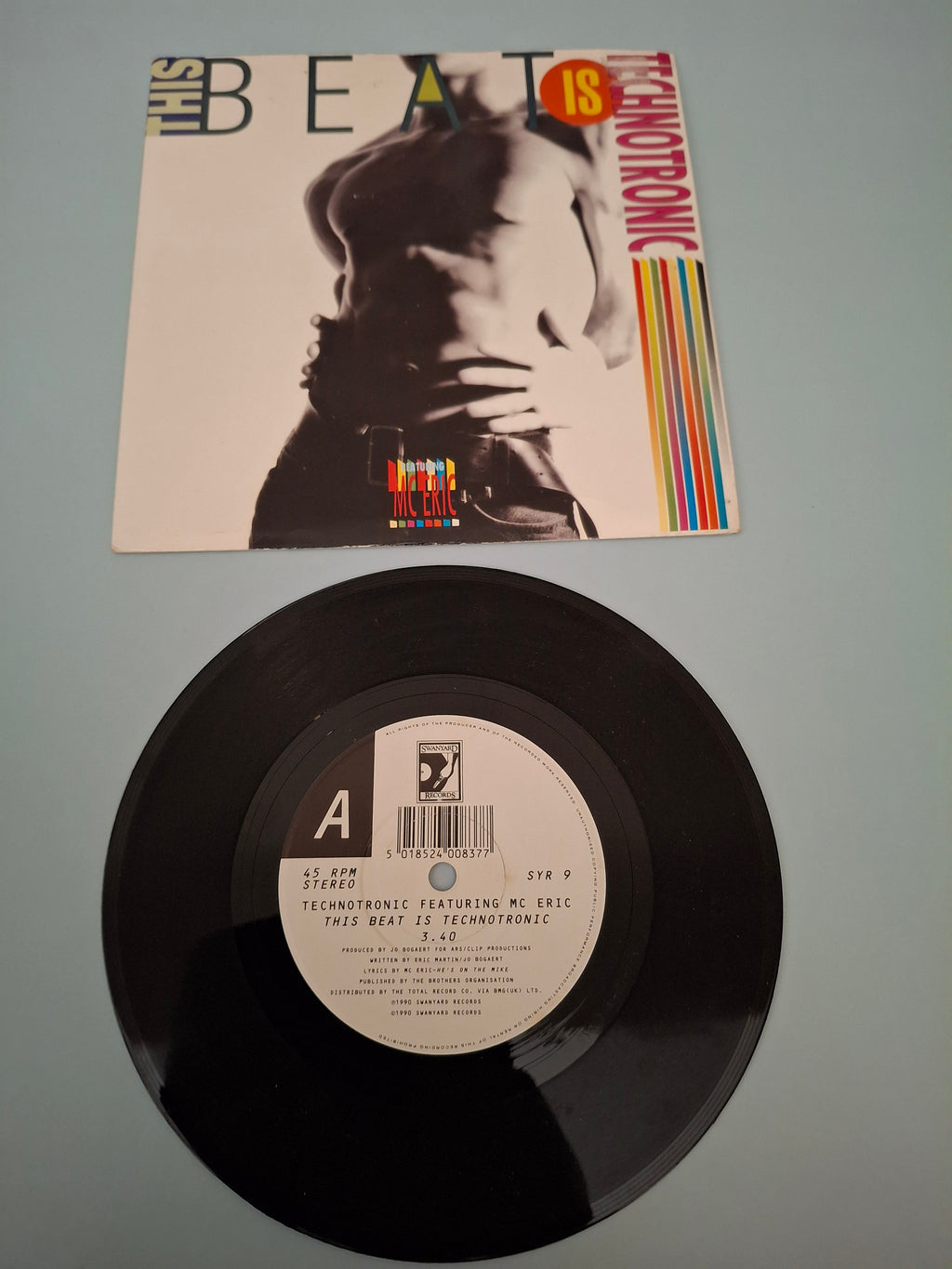 Technotronic Featuring MC Eric - This Beat Is Technotronic - 1990 UK 7" Vinyl Single (Swanyard, SYR 9)