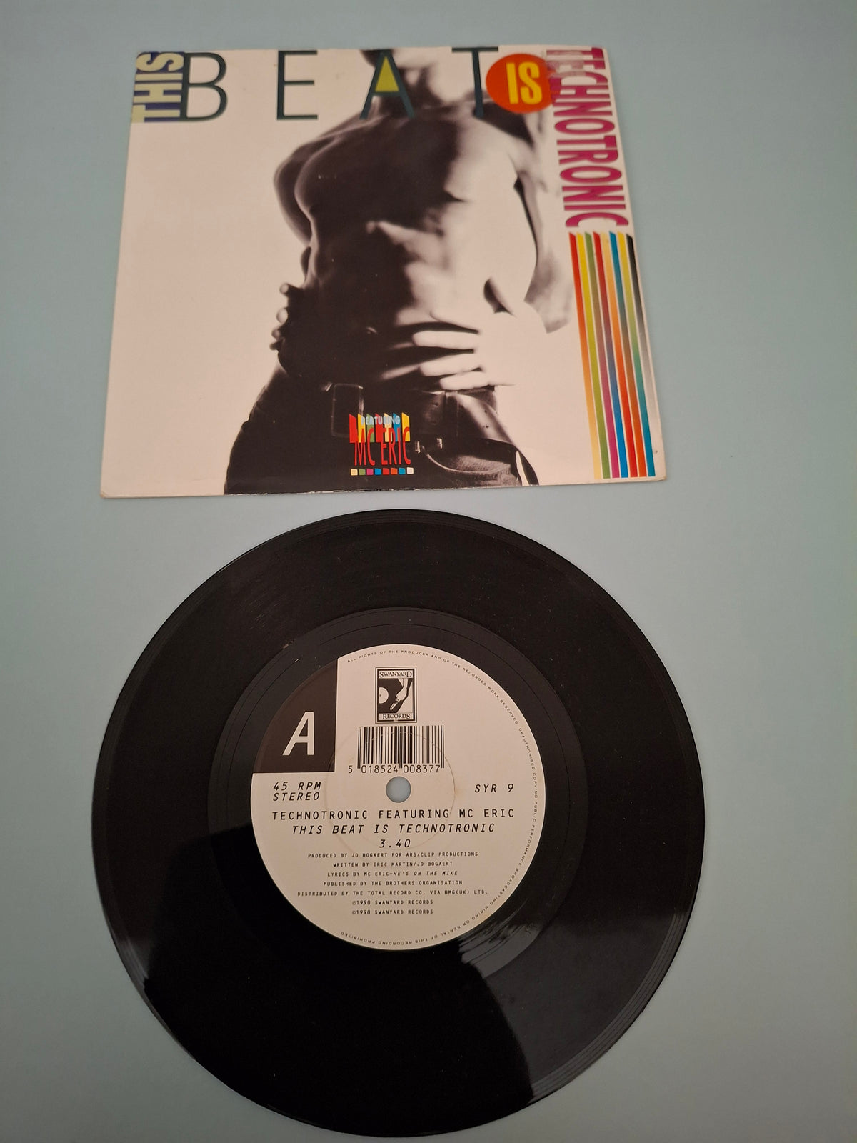 Technotronic Featuring MC Eric - This Beat Is Technotronic - 1990 UK 7" Vinyl Single (Swanyard, SYR 9)